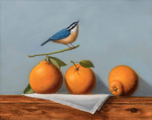 Small Bird on Oranges